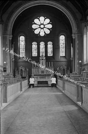 COLLEGE CHAPEL INTERIOR WITH STUDENTS